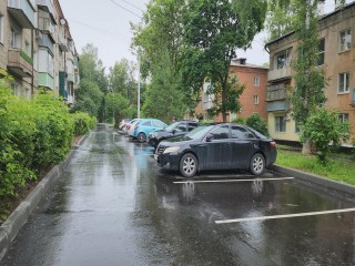 Новые парковки, асфальт и водоотвод обустроили во дворе в Ожерелье