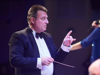 Пять лет во главе оркестра: как дирижер Подольской филармонии получил признание на государственном уровне