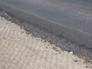 Улицу Новая в Корниловской «одели» в  асфальт