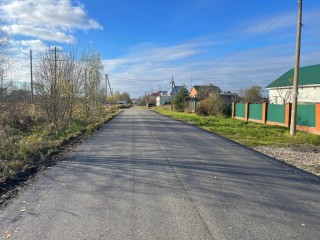 Новый асфальт уложили на улице Вишневой