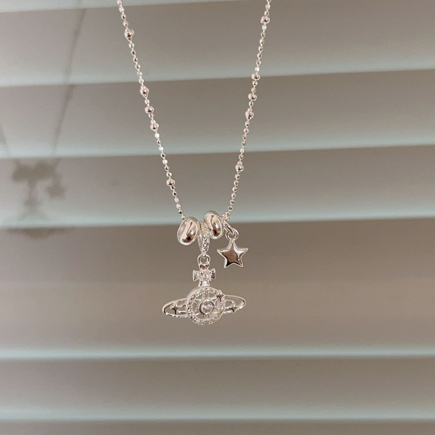Колье из серебра 925 «Сатурн» оптом из Китая — фотография 5
