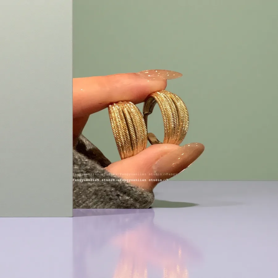 Серьги плетёные золотисто-серебристые оптом из Китая — фотография 2