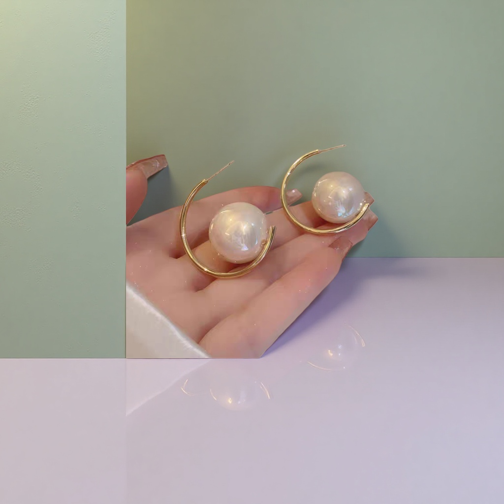 Серьги-кольца золотистые с жемчужиной оптом из Китая — фотография 4