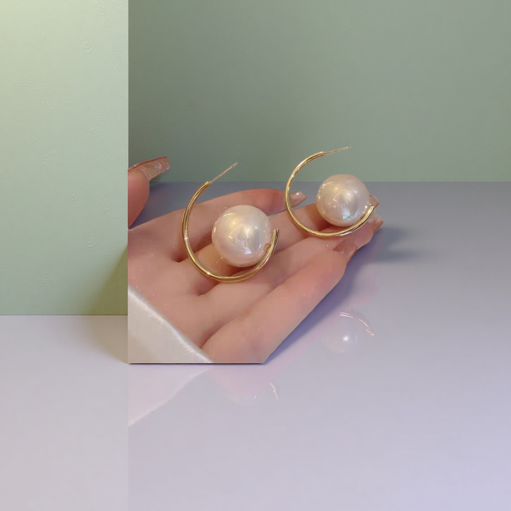 Серьги-кольца золотистые с жемчужиной оптом из Китая — фотография 5