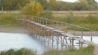 В Коми снесло течением мост, соединяющий несколько деревень через реку