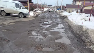 Жители микрорайона «Заря-2» просят отремонтировать дорогу  на ул. Земляничной к юбилею полета Гагарина