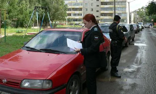 Судебные приставы выявят должников по припаркованным машинам