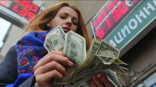 «Синие или зеленые»: как не пролететь за границей с долларами