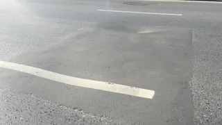 На Победе снова просел асфальт