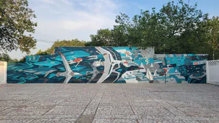 Художник из Коми создал вдохновляющий мурал в детском лагере в Анапе