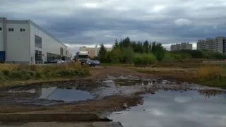 Размытая дорога возле ТЦ "Якорь"