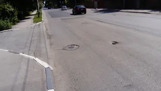 На улице Новой снова провалился асфальт