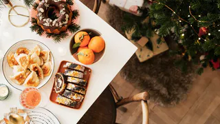 Как задобрить Зеленую Змею и стать сказочно богатым: что необходимо подать на новогодний стол 2025