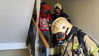 Чувашские пожарные спасали горожан из горящей высотки