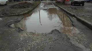 История одной лужи в фотографиях