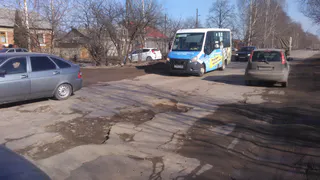 Лужи высохли – ямы углубились. Фоторепортаж с улицы Большая