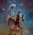 "Столпы творения" - структуры из газа и звёздной пыли зафиксированные телескопом в созвездии Орла.