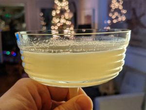 The 13th day of Cocktail Christmas is the Corpse Reviver -2. Equal parts gin, lillet, cointreau, and lemon juice, with 2 dashes of absinthe. If the holidays wiped you out, this will bring you back to the world of the living. As seen in.jpg