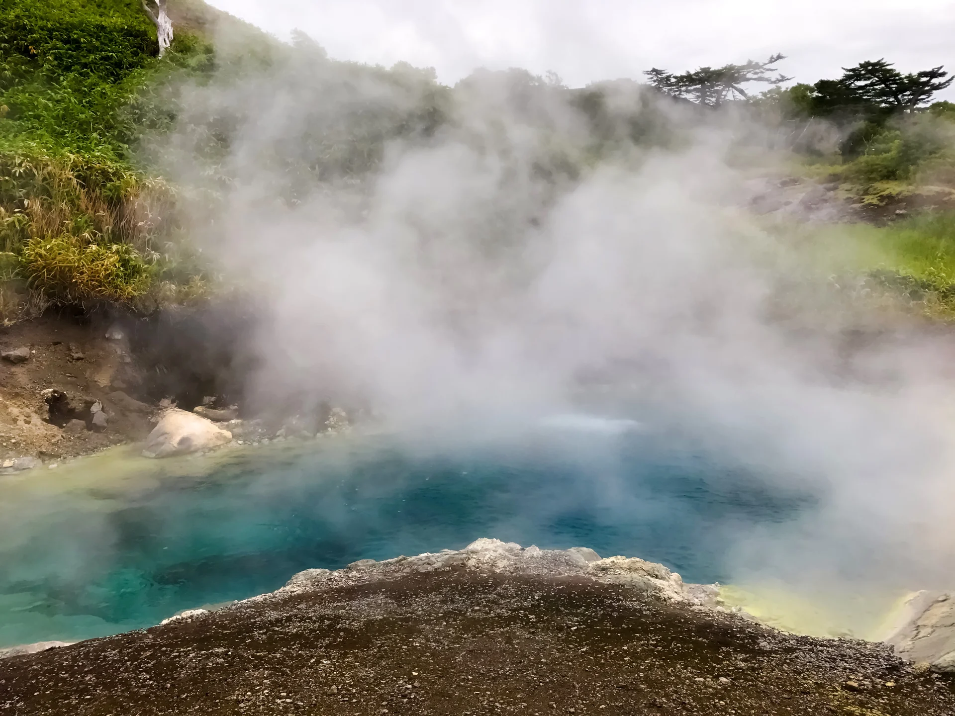 Swimming in natural hot springs