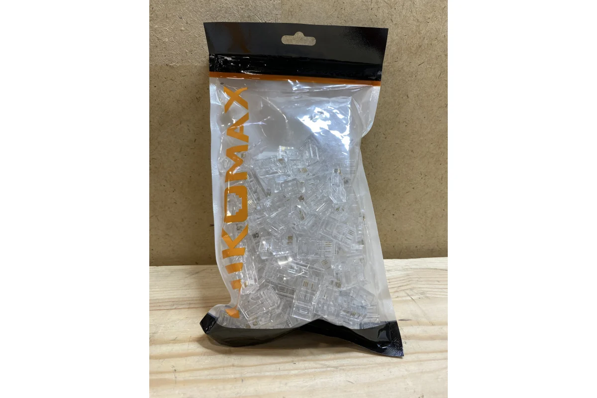 Коннектор Nikomax RJ45/8P4C под витую пару, Кат.5, 100МГц, покрытие 6мкд, универсальные ножи, неэкранированный, Ethernet-разводка (контакты 1,2,3,6), плоский ввод, уп-ка 100шт. NMC-RJ84FZ06UD1-100 NMC-RJ84FZ06UD1-100