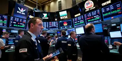 Бонусы на Уолл-Стрит продолжат расти на фоне волатильности и активных слияний