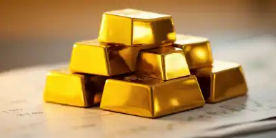 Золото достигло трехнедельного максимума