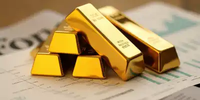 Золото стабилизируется после потерь на фоне неясности с ставками в США