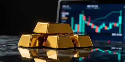 Золото слегка растет после двух дней падения на фоне снижения ставок ФРС