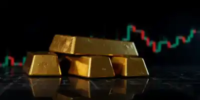 Золото сохраняет снижение на фоне торгового соглашения США и ЕС