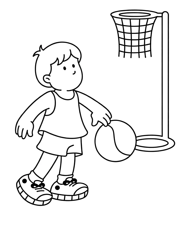 Мальчик играет в баскетбол