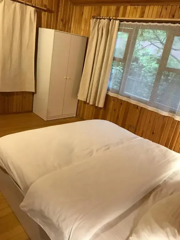 Standard Triple room with garden view