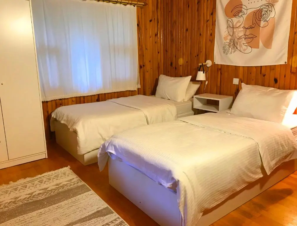 Standard Triple room with garden view