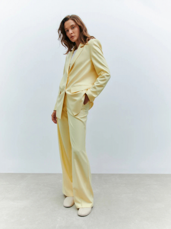 Расклешенные длинные брюки