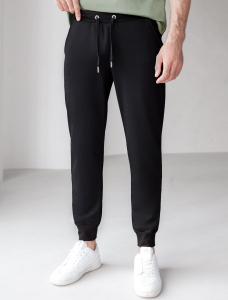 Брюки из тонкого футера с карманом на молнии