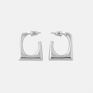 Серебристые контурные серьги