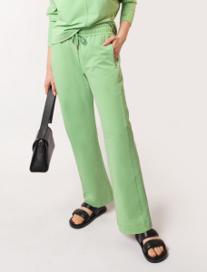 Брюки из эластичного футера с молниями на карманах