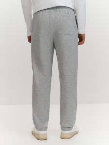 Брюки из хлопкового трикотажа с брендированным принтом