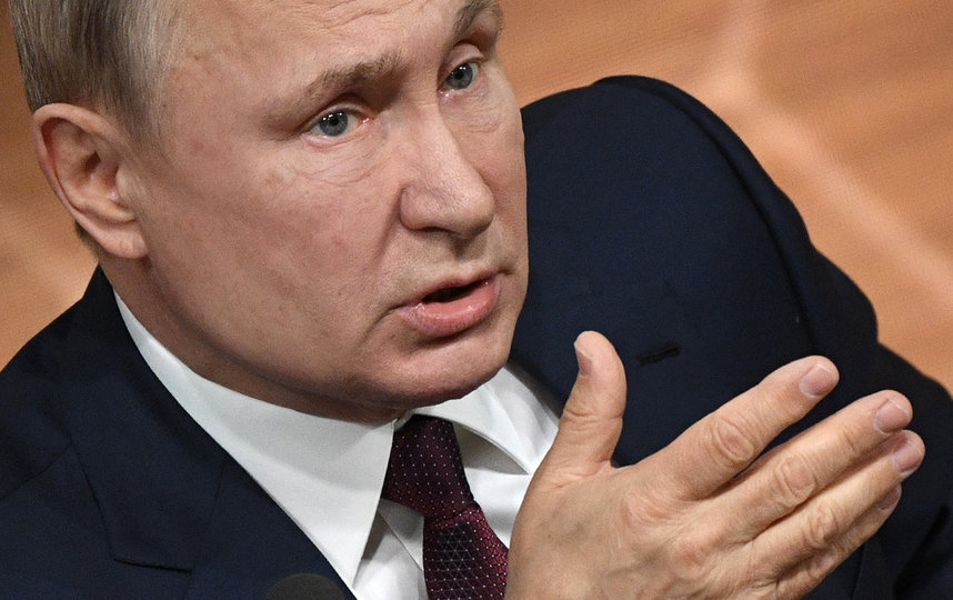 Владимир Путин во время 15-й пресс-конференции для СМИ. Фото AFP