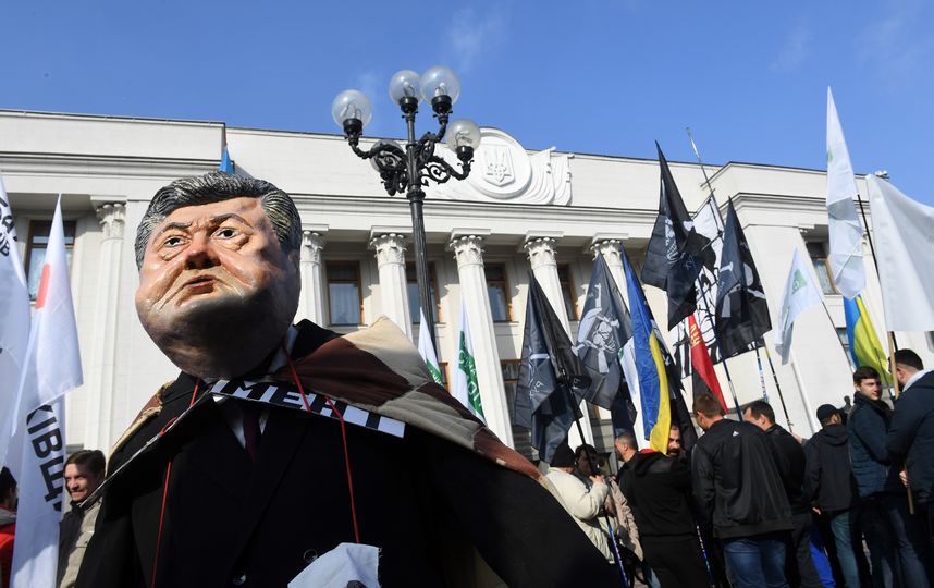 В центре Киева возле здания Верховной рады начались столкновения между протестующими и полицией. Фото AFP