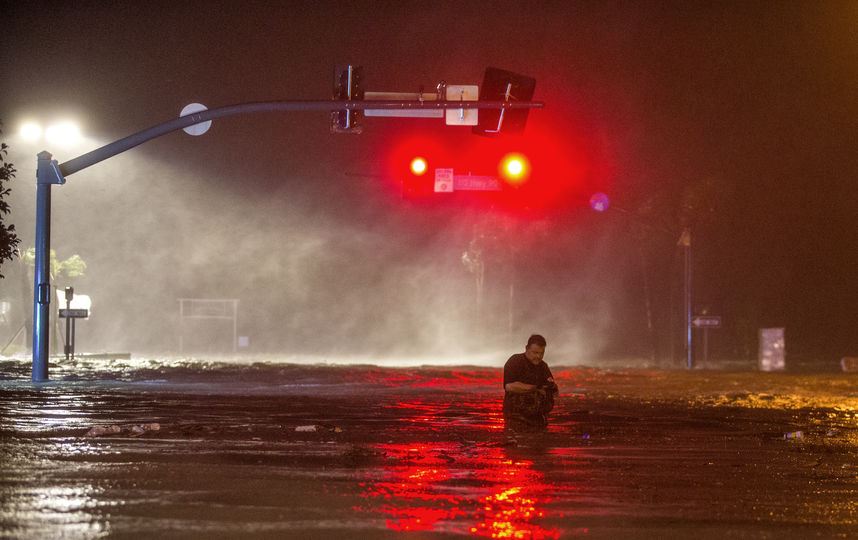 Жители Нового Орлеана готовятся к удару стихии. Фото AFP