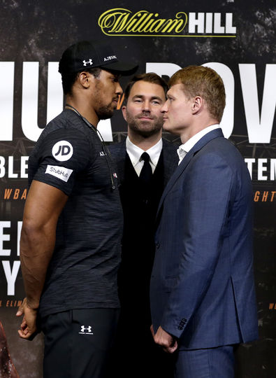 Александр Поветкин и Энтони Джошуа на дуэли взглядов. Фото Getty