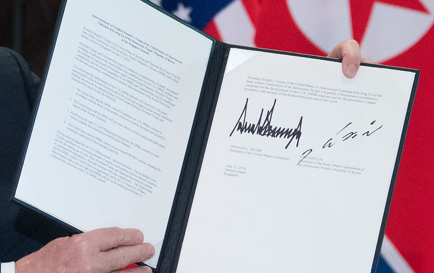 Соглашение, подписанное по итогам встречи лидеров США и Северной Кореи, содержит четыре ключевых пункта. Фото AFP