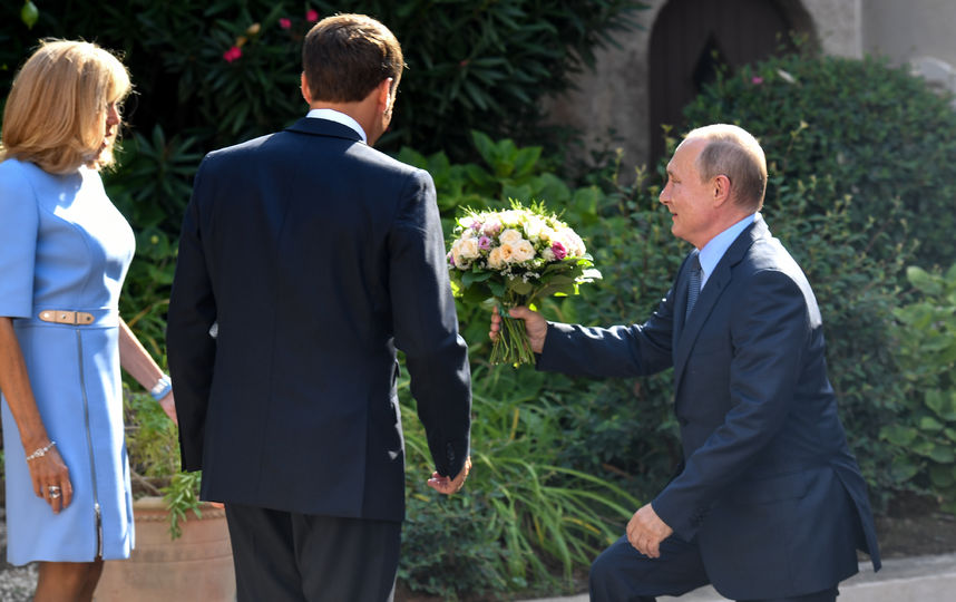 Брижит Макрон, Эммануэль Макрон и Владимир Путин. Фото AFP
