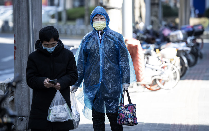 Жители Шанхая. Фото AFP