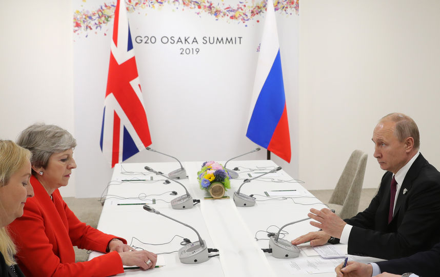 Владимир Путин и Тереза Мэй. Фото AFP