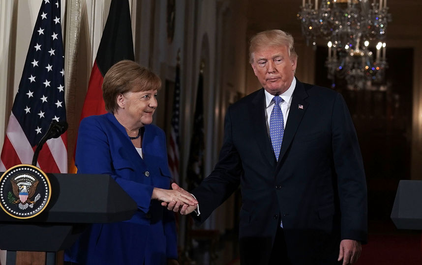 Дональд Трамп и Ангела Меркель. Фото Getty
