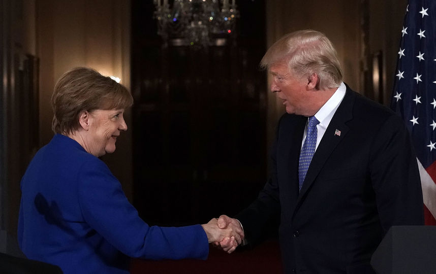 Дональд Трамп и Ангела Меркель. Фото Getty