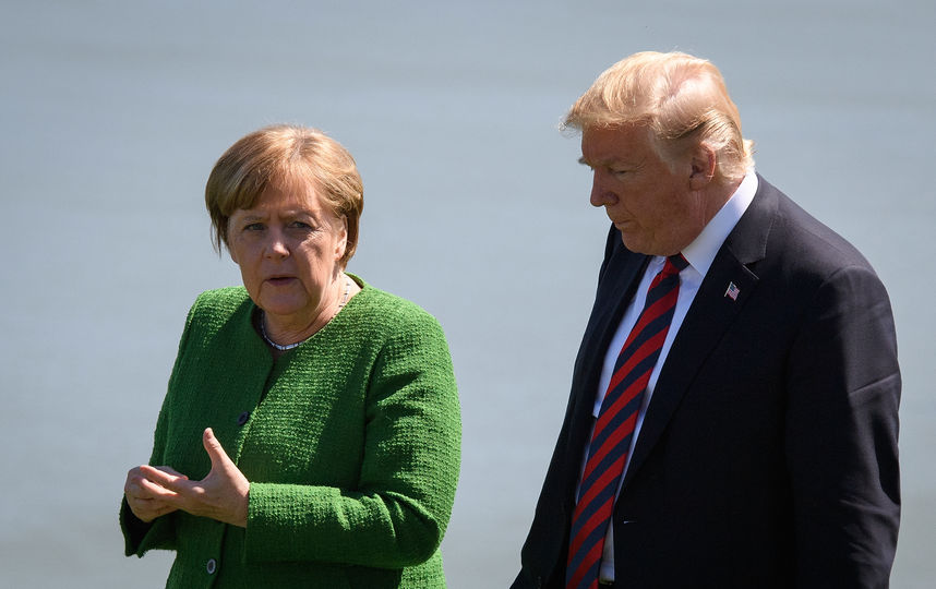 Дональд Трамп и Ангела Меркель. Фото Getty