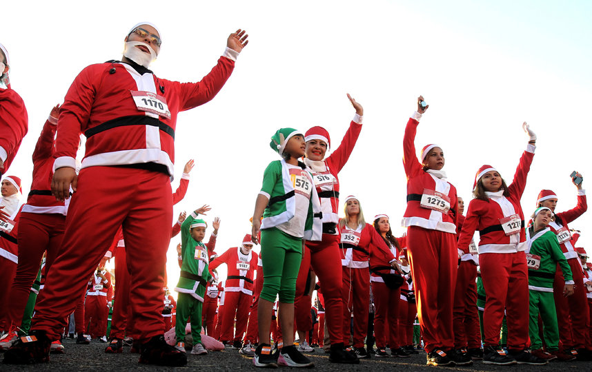 Забег Санта-Клаусов в Гвадалахаре, Мексика. Фото AFP
