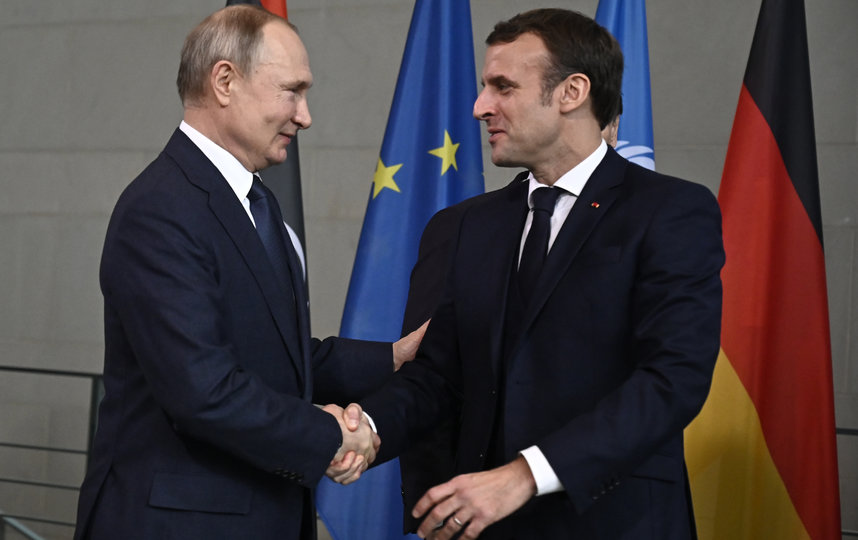 Владимир Путин и Эммануэль Макрон на Берлинской конференции. Фото AFP